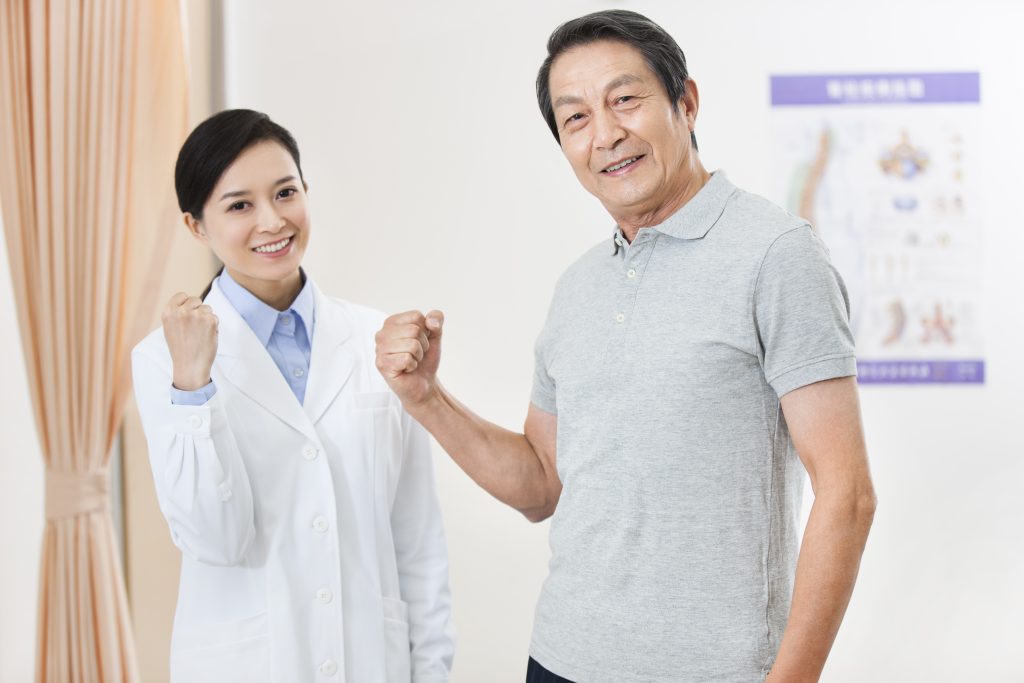 cheerful female doctor and senior patient